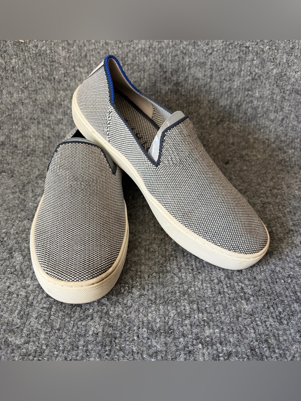 Rothy'sโ Slip-On Knit Flats in Navy and White with Blue Trim